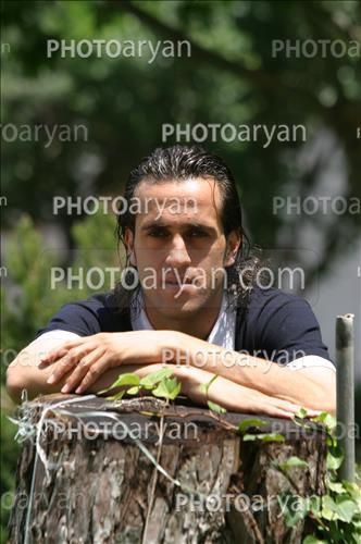 <span style='background: #33747a;font-weight: 300;font-size: 10px;box-shadow: 2px 3px 5px black;border-radius: 2px;margin: 2px;color: #fff;padding: 2px 5px;font - size: 10px;line - height: 22px; '>علی کریمی Ali Karimi</span> 