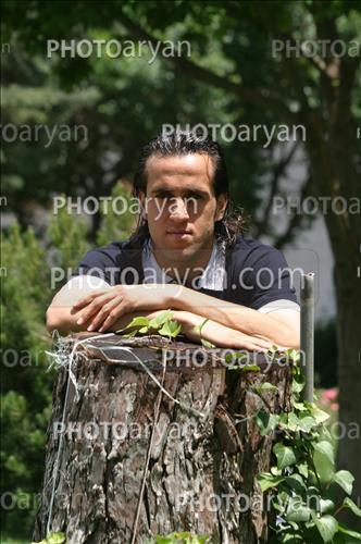 <span style='background: #33747a;font-weight: 300;font-size: 10px;box-shadow: 2px 3px 5px black;border-radius: 2px;margin: 2px;color: #fff;padding: 2px 5px;font - size: 10px;line - height: 22px; '>علی کریمی Ali Karimi</span> 