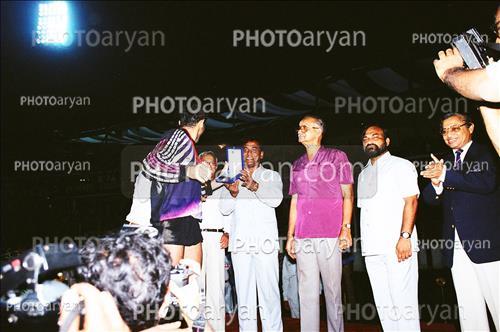 <span style='background: #33747a;font-weight: 300;font-size: 10px;box-shadow: 2px 3px 5px black;border-radius: 2px;margin: 2px;color: #fff;padding: 2px 5px;font - size: 10px;line - height: 22px; '>احمدرضا عابدزاده Ahmad Reza Abedzadeh</span> 