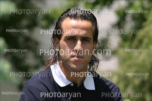 <span style='background: #33747a;font-weight: 300;font-size: 10px;box-shadow: 2px 3px 5px black;border-radius: 2px;margin: 2px;color: #fff;padding: 2px 5px;font - size: 10px;line - height: 22px; '>علی کریمی Ali Karimi</span> 