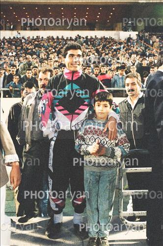 <span style='background: #33747a;font-weight: 300;font-size: 10px;box-shadow: 2px 3px 5px black;border-radius: 2px;margin: 2px;color: #fff;padding: 2px 5px;font - size: 10px;line - height: 22px; '>احمدرضا عابدزاده Ahmad Reza Abedzadeh</span> 