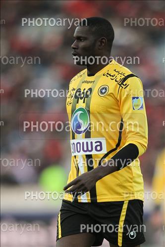 <span style='background: #33747a;font-weight: 300;font-size: 10px;box-shadow: 2px 3px 5px black;border-radius: 2px;margin: 2px;color: #fff;padding: 2px 5px;font - size: 10px;line - height: 22px; '>موسي کوليبالي</span> 