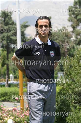 <span style='background: #33747a;font-weight: 300;font-size: 10px;box-shadow: 2px 3px 5px black;border-radius: 2px;margin: 2px;color: #fff;padding: 2px 5px;font - size: 10px;line - height: 22px; '>علی کریمی Ali Karimi</span> 