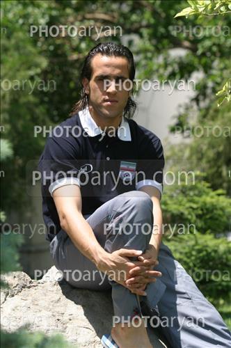 <span style='background: #33747a;font-weight: 300;font-size: 10px;box-shadow: 2px 3px 5px black;border-radius: 2px;margin: 2px;color: #fff;padding: 2px 5px;font - size: 10px;line - height: 22px; '>علی کریمی Ali Karimi</span> 